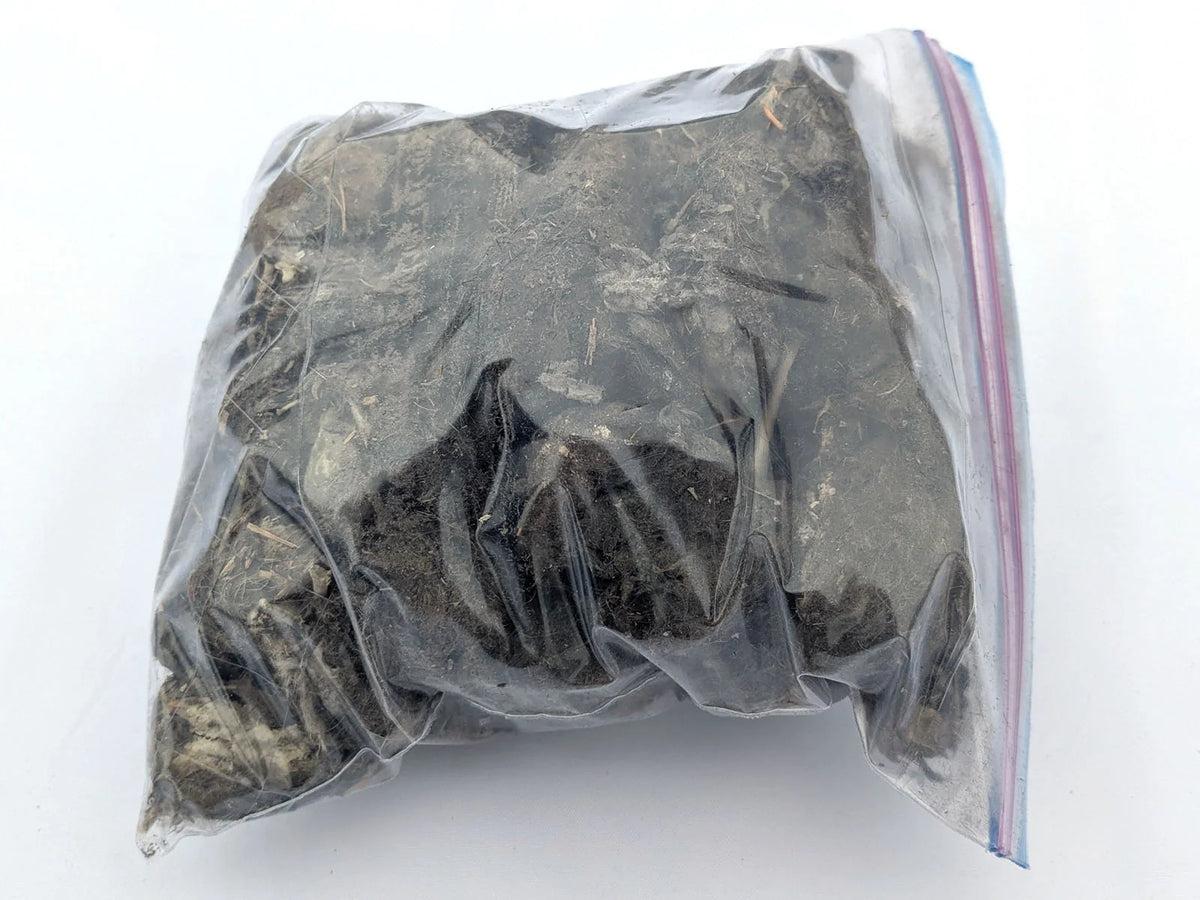 Quart bag filled with Bargain #2 barn owl pellet material