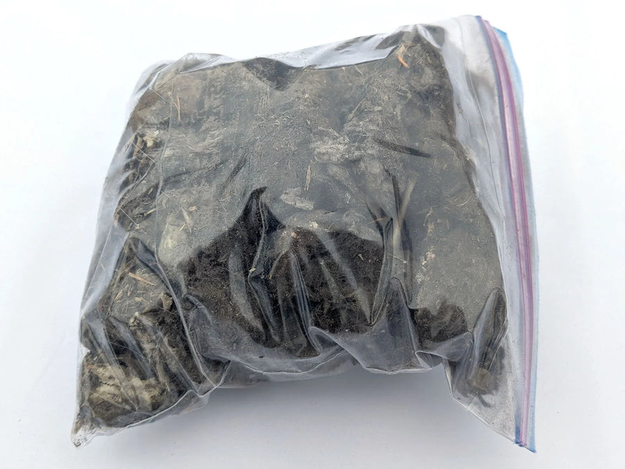 Quart bag filled with Bargain #2 barn owl pellet material