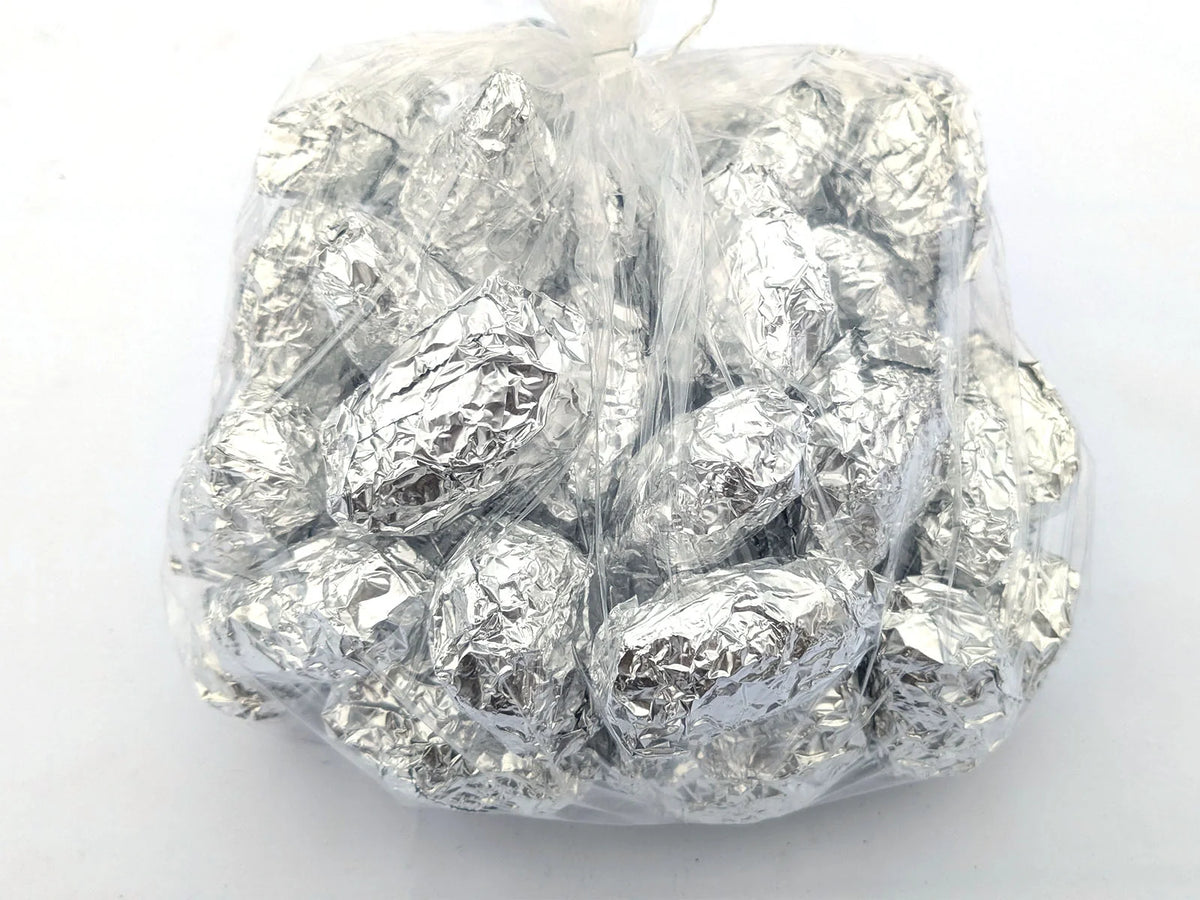 Bag of individually foil-wrapped barn owl pellets